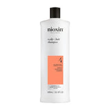 Nioxin System 4 Scalp + Hair Shampoo - Hair Thickening Shampoo For Damaged Hair with Progressed Thinning, 16.9 fl oz (Packaging May Vary)