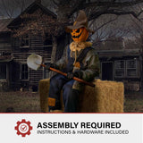 Haunted Hill Farm Motion-Activated Smiling Jack The Shovel-Wielding Sitting Scarecrow by Tekky, Talking Jump-Scare Halloween Animatronic, Plug-in or Battery Operated Halloween Decorations