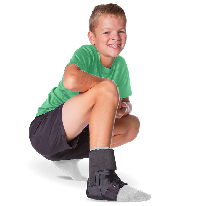 BraceAbility Lace Up Kids Ankle Brace - Pediatric Figure 8 Sprained Foot Support Wrap for Active Youth, Children in Sports, Basketball Protection, Gymnastics, Soccer, and Volleyball (XS)