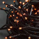 Twinkle Star 33FT 100 LED Halloween String Lights Orange, Plug in Black Wire Fairy Lights 8 Modes Waterproof Mini Light for Outdoor Indoor Christmas Tree Holiday Wedding Party Bedroom Patio Tree Decor